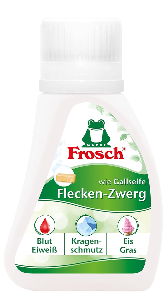 Petit contenant blanc de détachant liquide Frosch posé sur du lin écru dans une buanderie