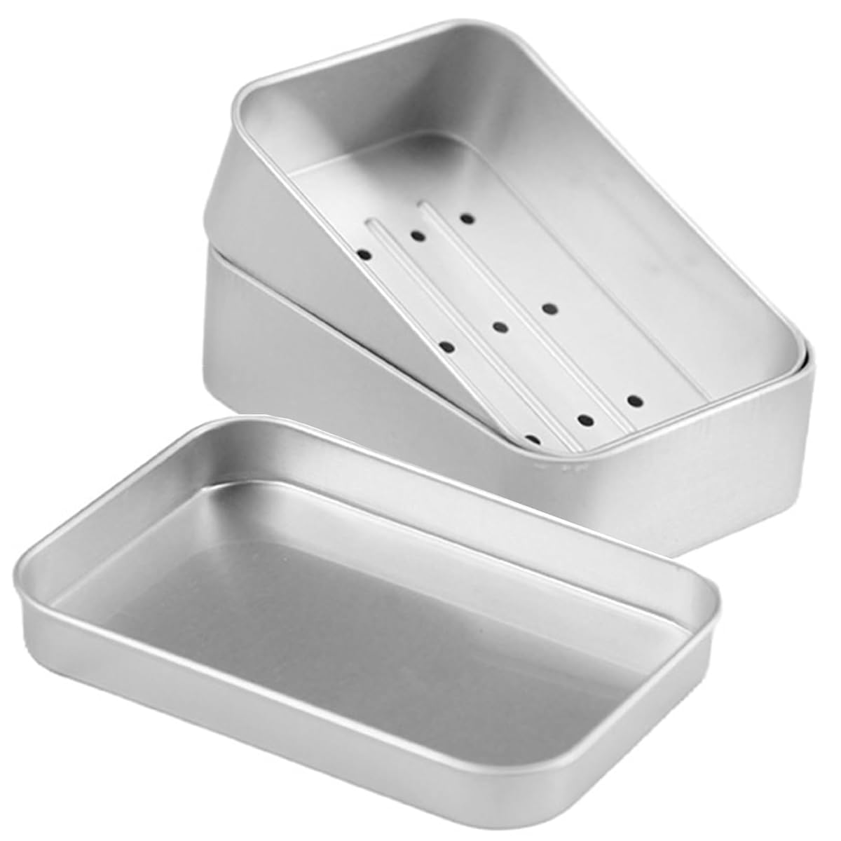 Boîte à savon de voyage en aluminium avec panier intérieur amovible, posée sur du lin écru