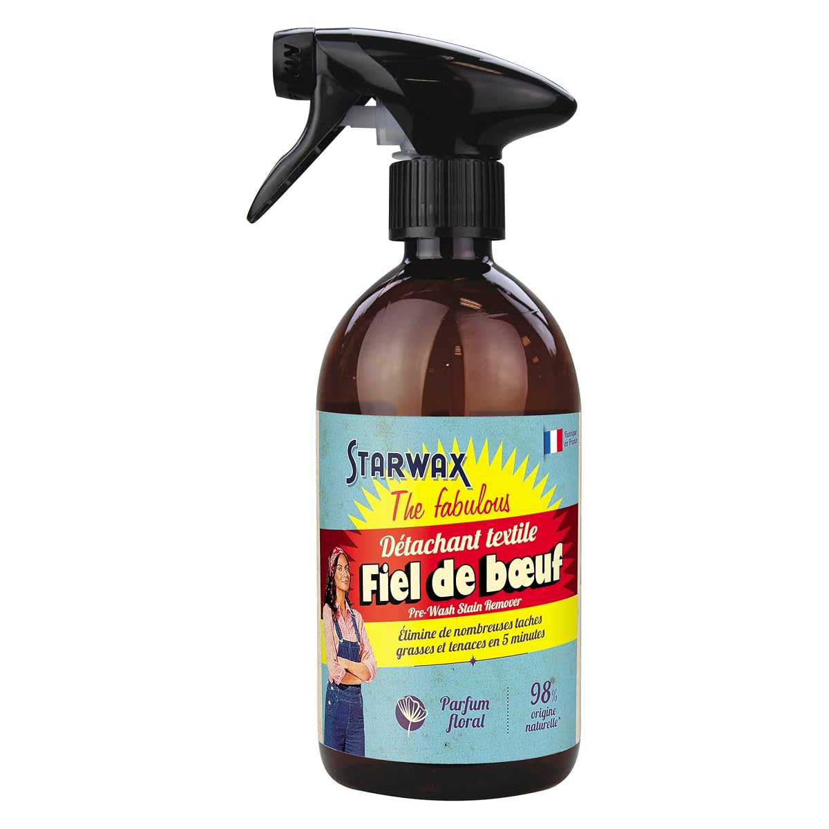 Flacon spray détachant au fiel de bœuf posé près d’un linge écru dans une buanderie