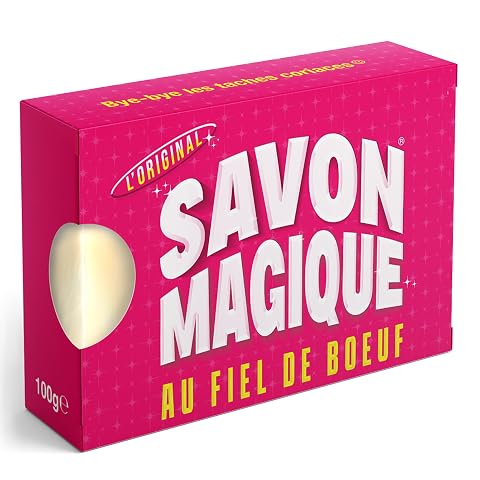 Pain de savon détachant au fiel de bœuf posé sur du lin écru dans une buanderie sobre