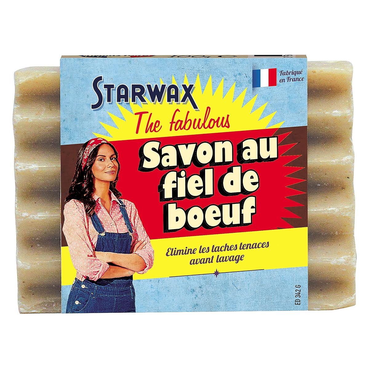 Pain de savon solide au fiel de bœuf posé sur du lin écru dans une buanderie sobre